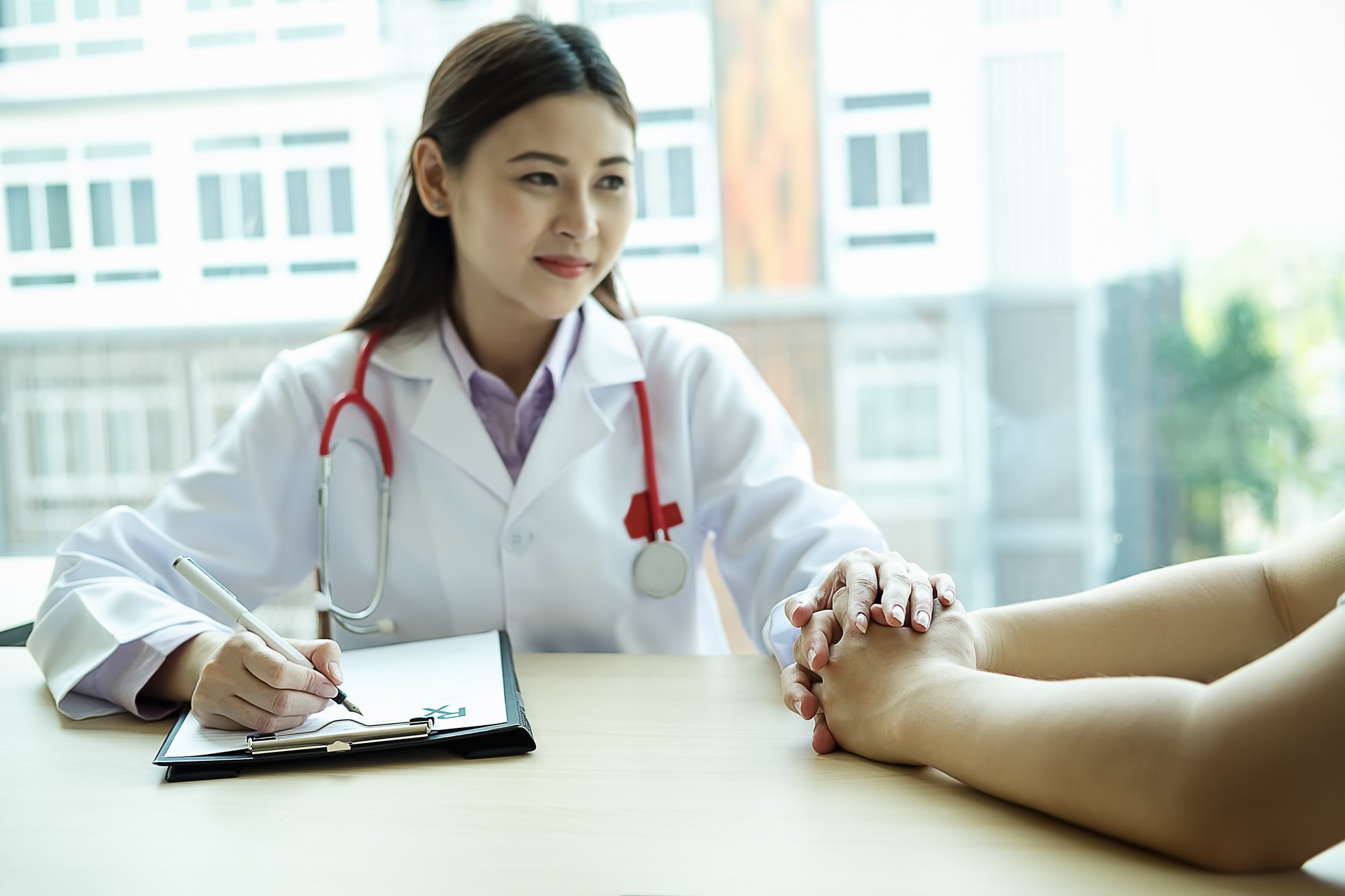 Close up of Professional Doctor and Patient 